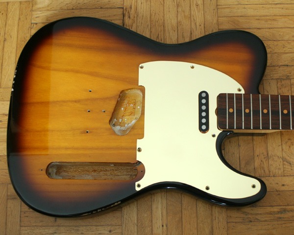 Telecaster pickguard, brass