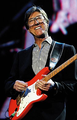 Hank Marvin with a fiesta red Strat (here a later reissue)