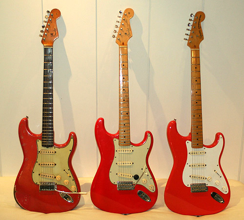 Original fiesta red (left), the refinished Strat in the middle is similar to hot rod red, the fiesta red Squier (right) is more towards an orange-red