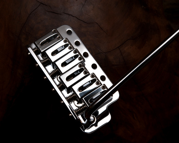 The chrome-plated tremolos on Schecter Dream Machine Strats were also of brass