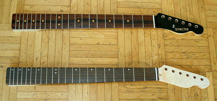 Both necks - note the different colour of the rosewood fingerboards