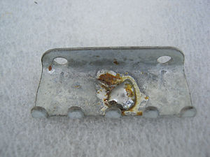 Original 1963 tremolo claw - note trapezoid shape